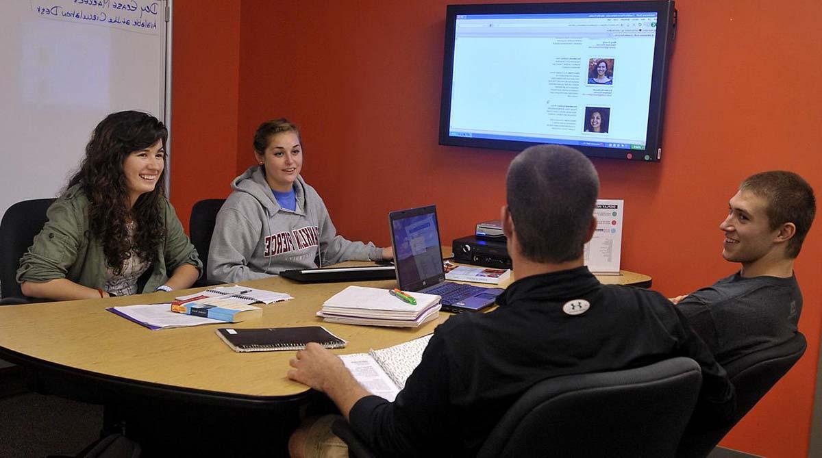 Undergraduate students meeting for class homework at Franklin Pierce University.